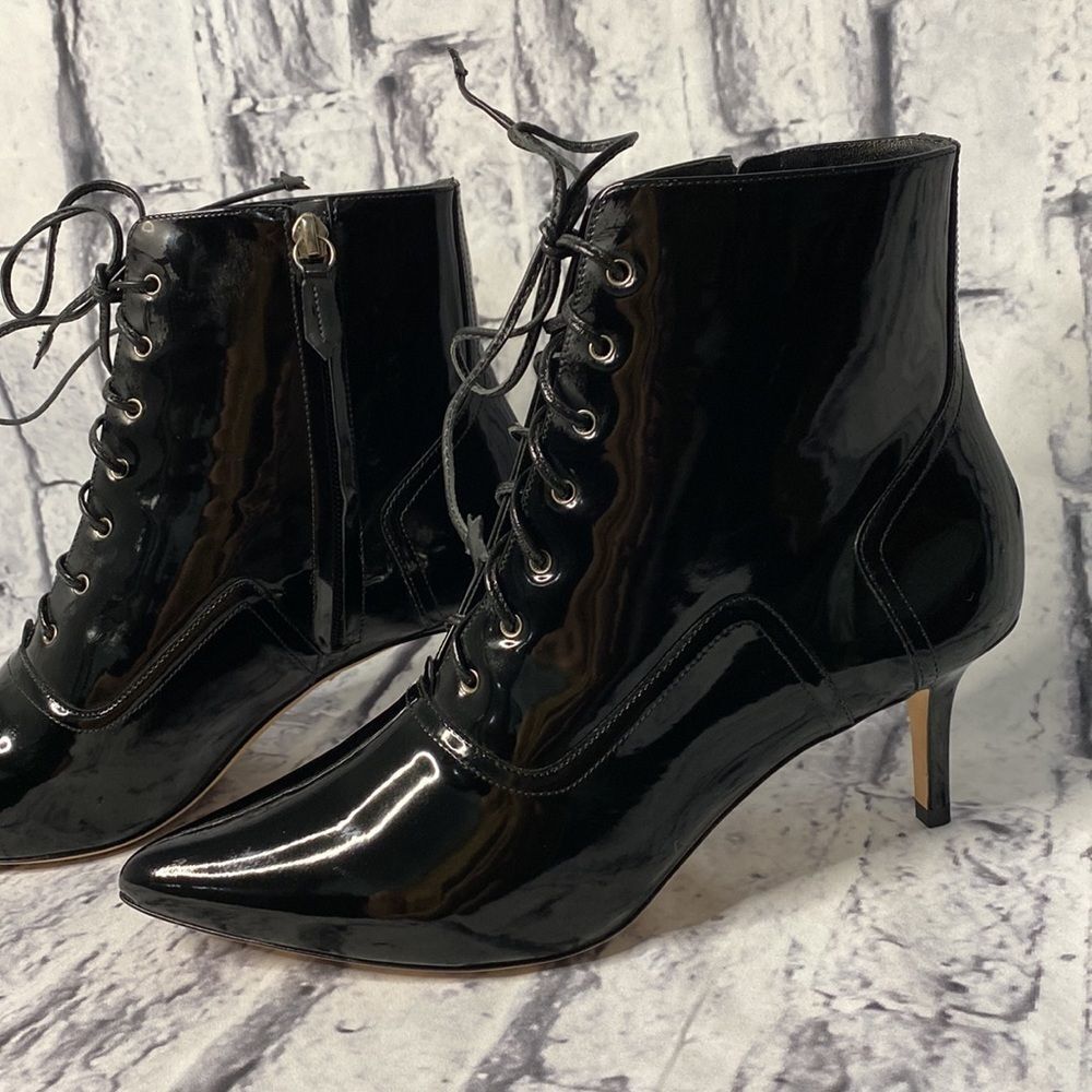 *Isa Tapia Black patent leather with lace up detail